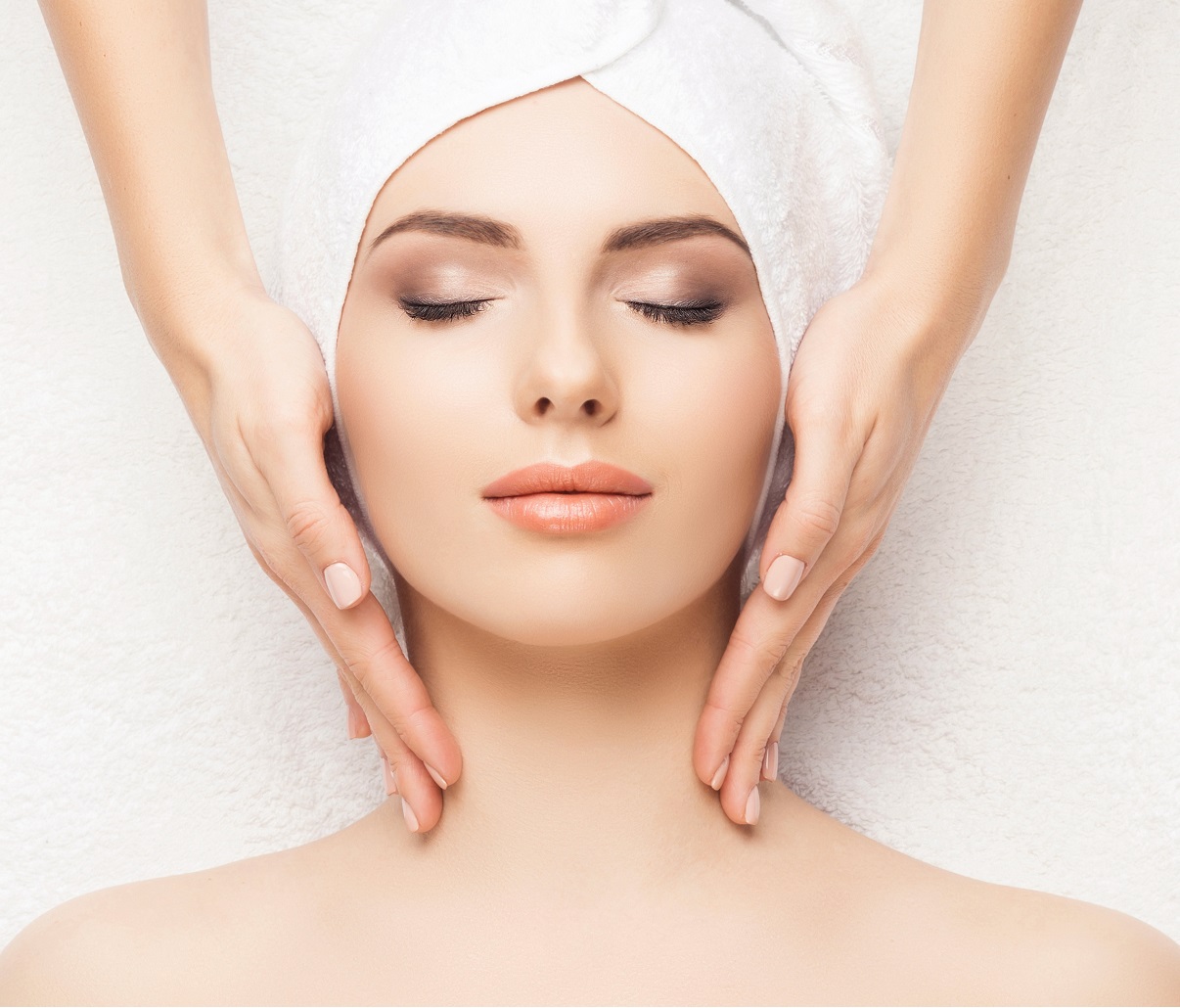 Portrait of a woman in spa. Massage healing procedure. Health care, skin lifting and medical concept | Aesthetic Center of Richmond Dermatology in Medical spa in Glen Allen, VA