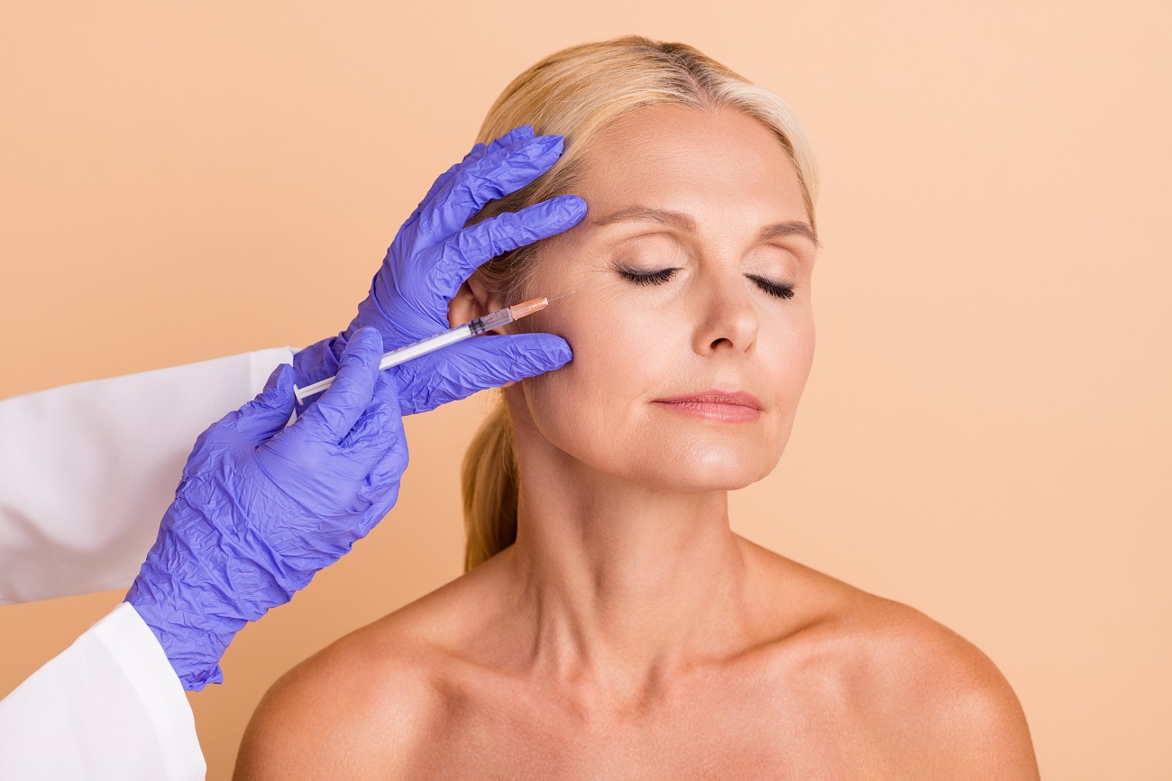 Middle aged woman Getting Sculptra injection | skin tightening treatment | Aesthetic Center of Richmond | Glen Allen, VA