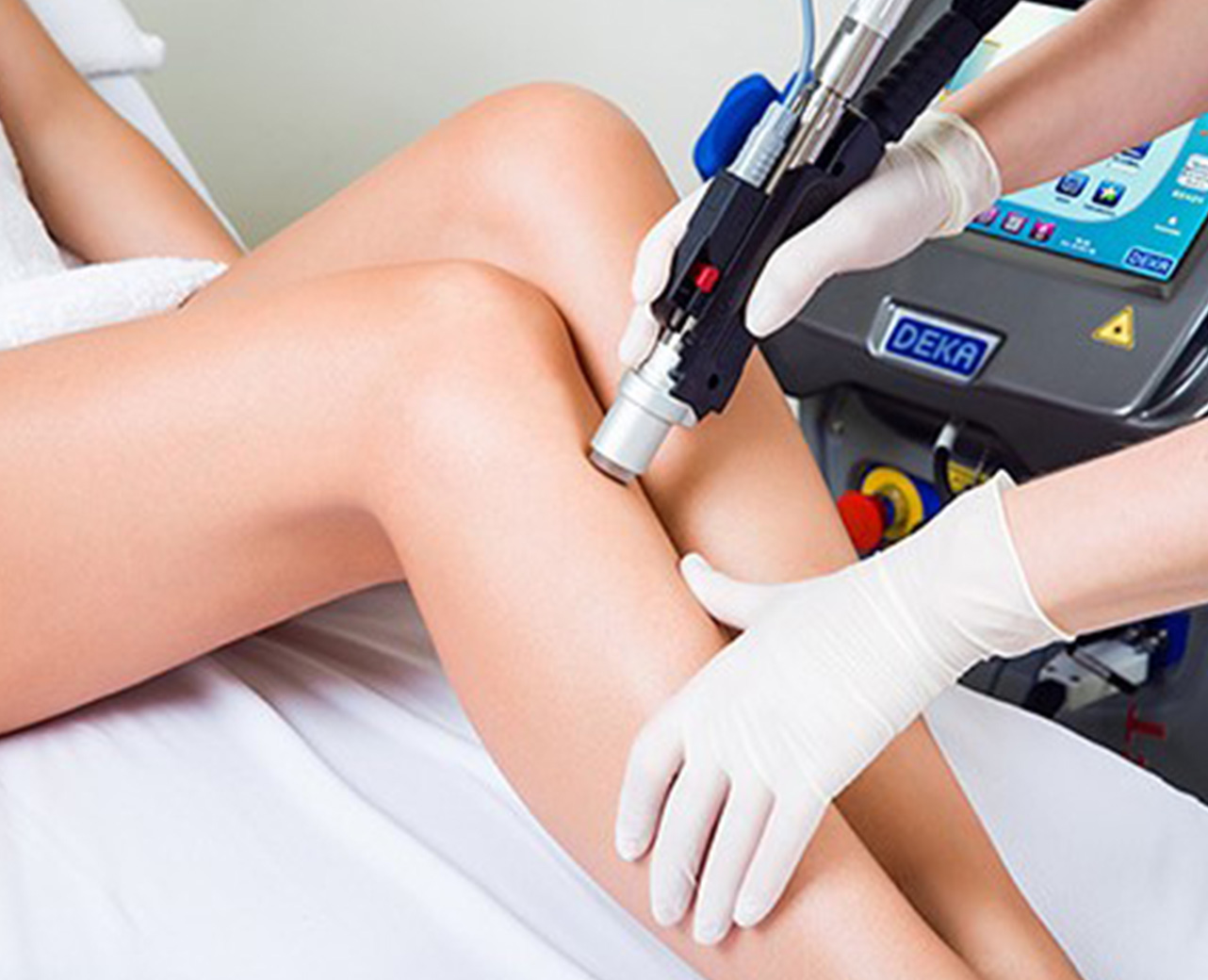 A Woman getting laser hair removal treatment on her legs | Aesthetic Center of Richmond in Glen Allen, VA