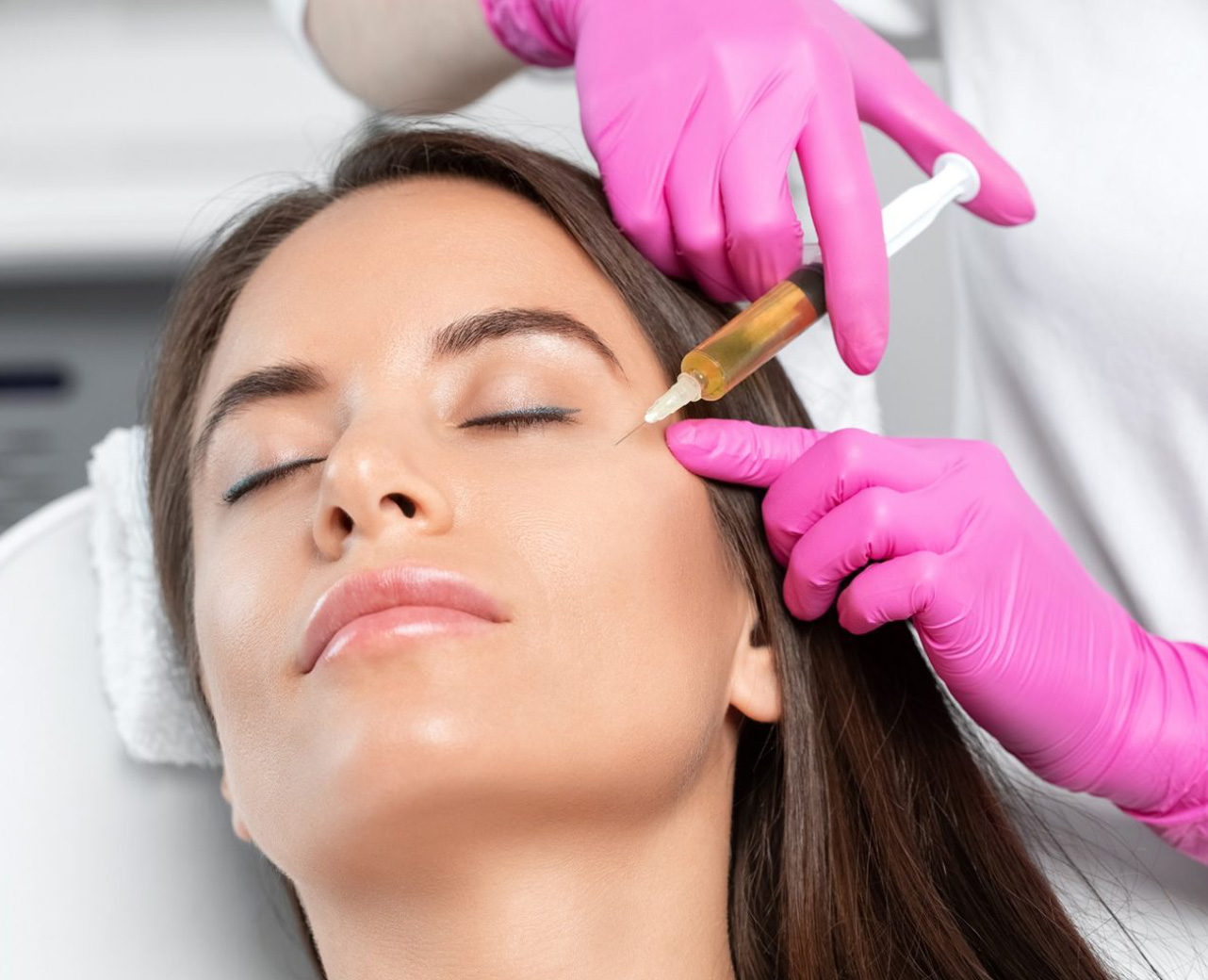 A Woman getting injection on her cheeks | PRP/PRF | Aesthetic Center of Richmond in Glen Allen, VA