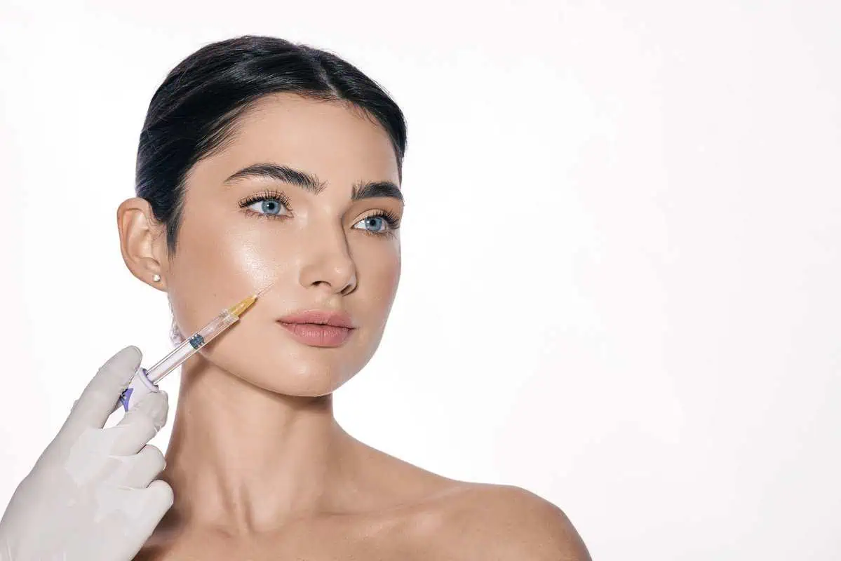 A woman is receiving Sculptra Treatment in Glen Allen, VA at Aesthetic Center of Richmond Dermatology